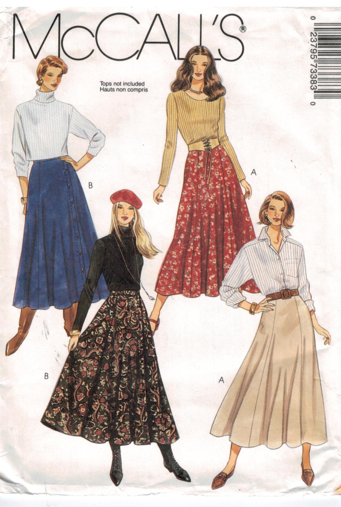 McCalls Pattern 7338 Misses Midi Calf Length A Line Skirts zip back or  button front closing sizes 10, 12, 14